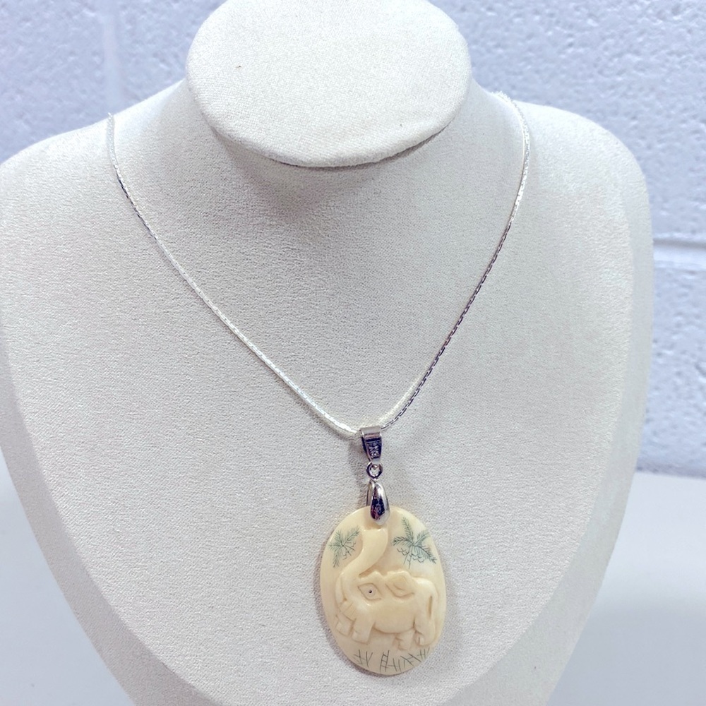 Elephant pendant with gold plated clasp and custom 24” necklace​​​​​​​​​…​
